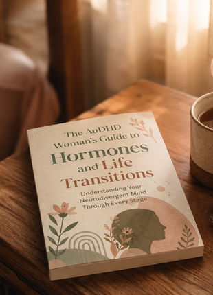 Paperback copy of The AuDHD Woman's Guide to Hormones and Life Transitions by Constantino Maria Porter, ISBN 9781764223560, neurodivergent ADHD and autism book
