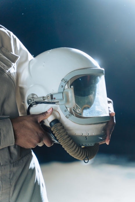 Astronaut helmet representing space theme and imagination in Wonder by R J Palacio